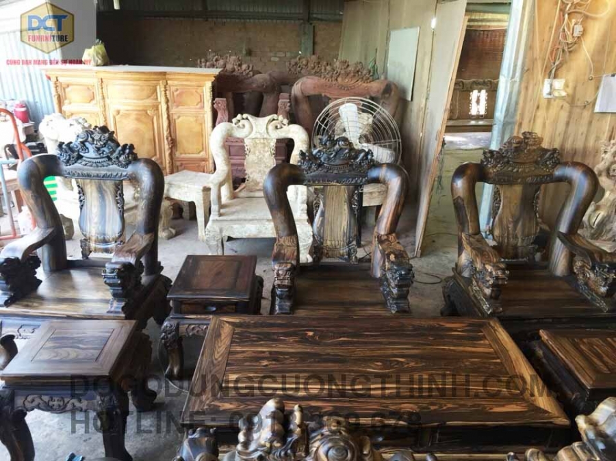 Bàn ghế Mun sọc chạm Nghê