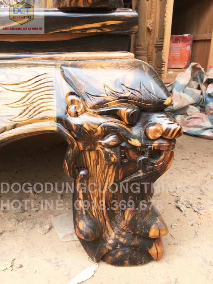 Bàn ghế mun sọc chạm Nghê